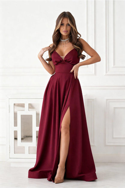 Burgundy long dress with spaghetti straps, deep V-neck, and side slit