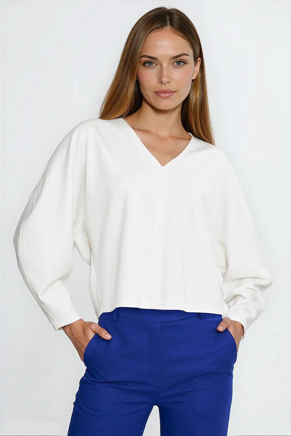 Oversize V-neck blouse in white with long loose sleeves