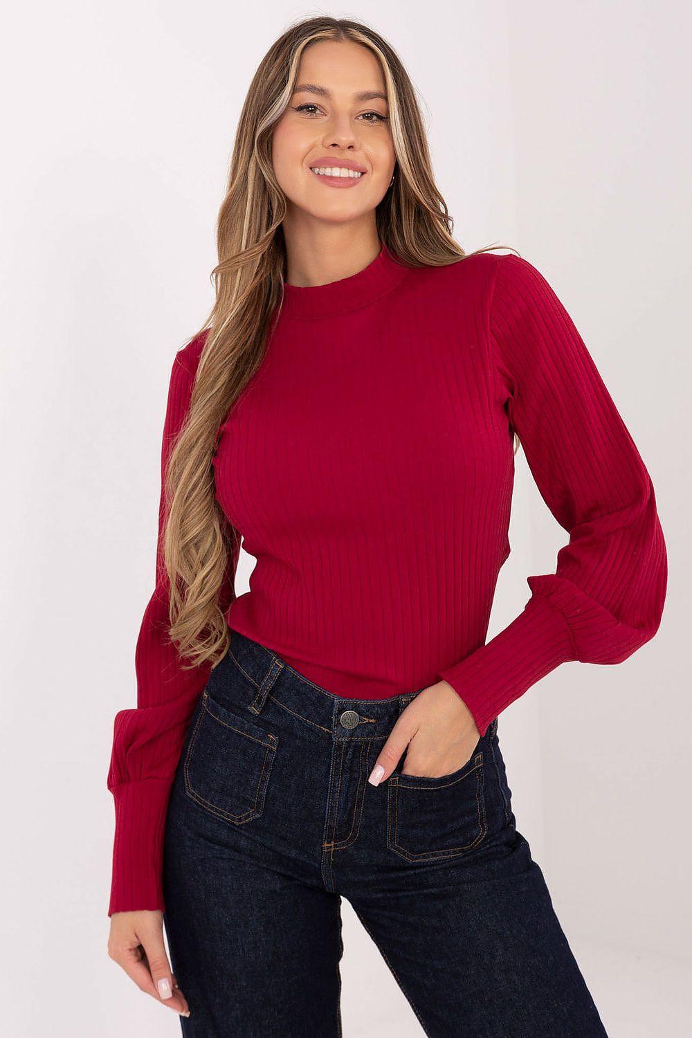 Red ribbed turtleneck blouse with puffy sleeves and fitted waist