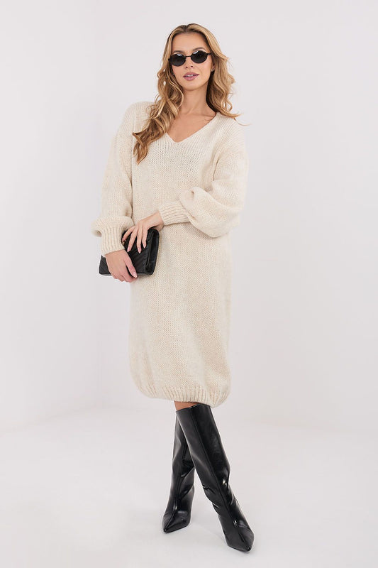 Oversized knit midi daydress in beige, V-neck, long sleeves, relaxed fit.