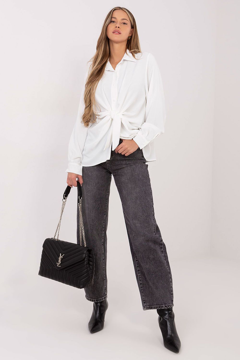 Women's long sleeve white shirt, front view with tied knot at waist