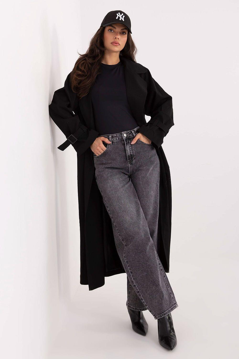 Black short-sleeve blouse with crew neck and slight drape at front.