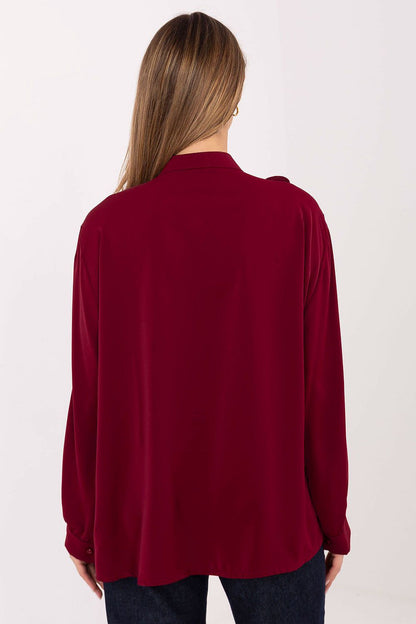 Women’s burgundy ruffle long-sleeve button shirt, back view