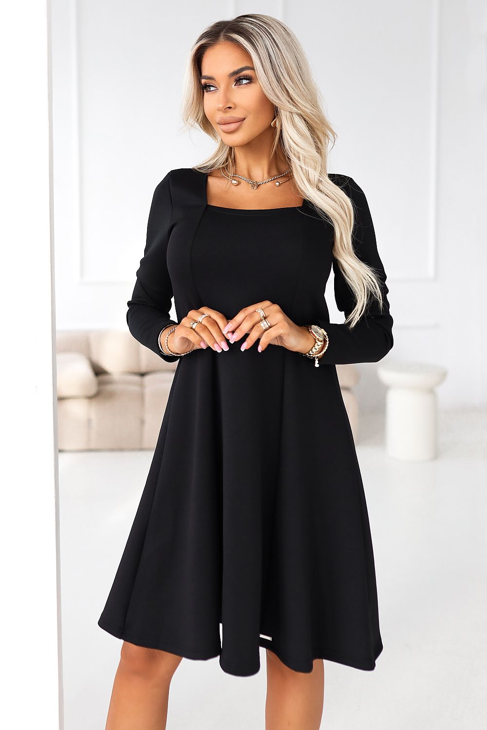 Black flared long-sleeve daydress with square neckline and A-line skirt