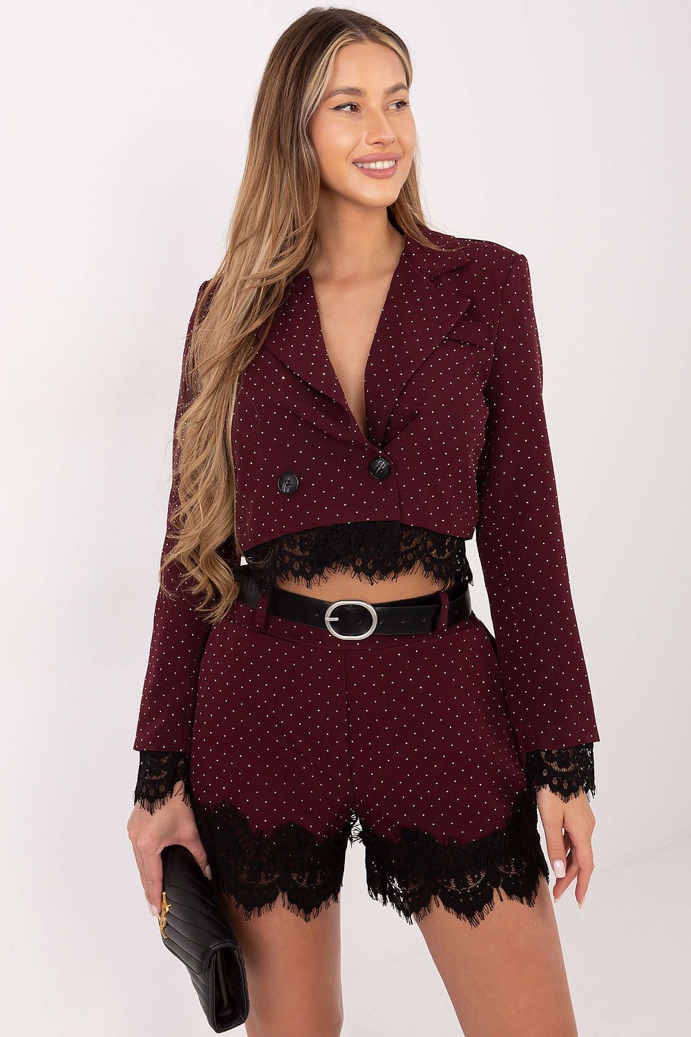 High-waist lace-trim shorts in dark red with small polka dots and black lace hem, with belt