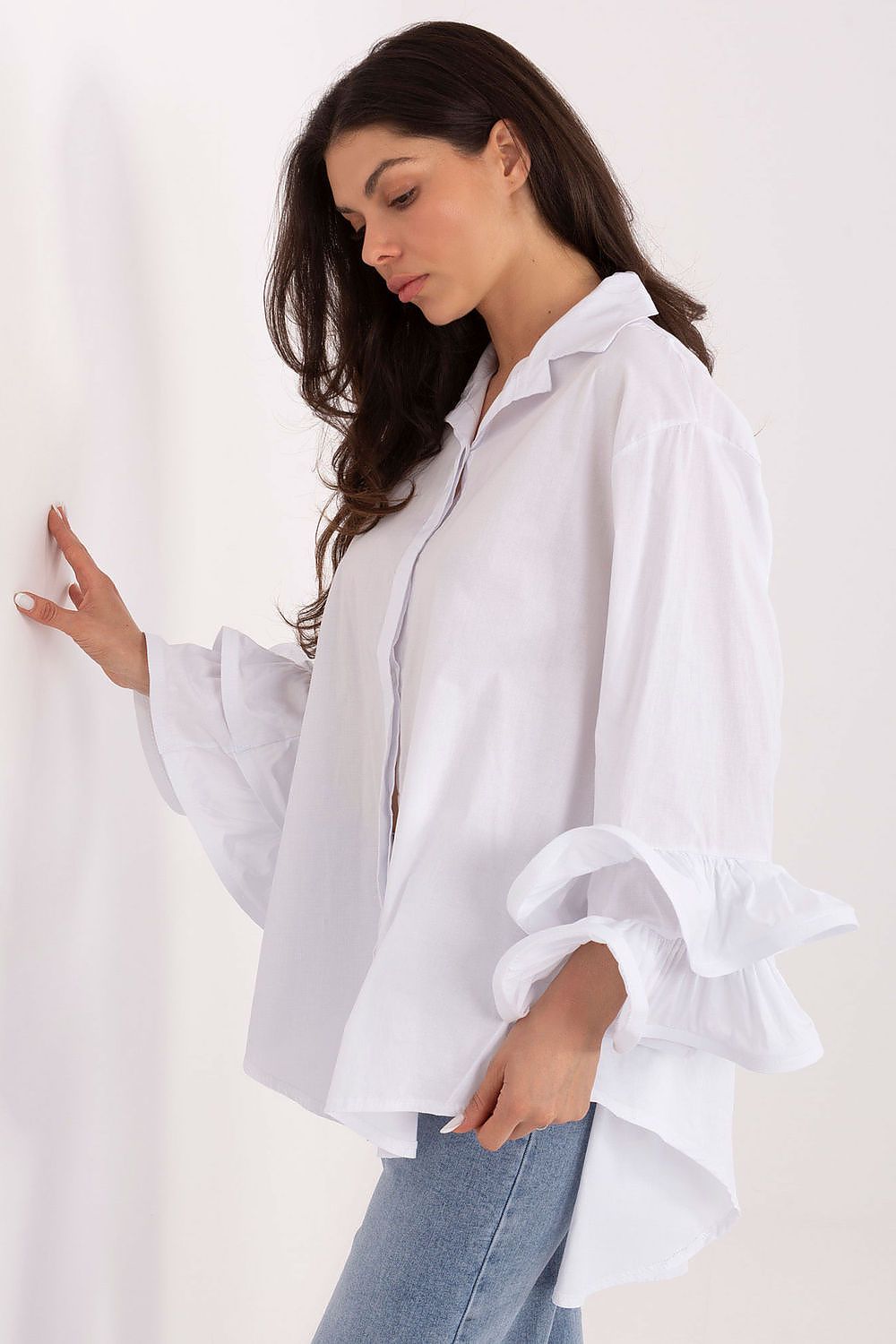 White women’s long-sleeve shirt with frilled cuffs and button front