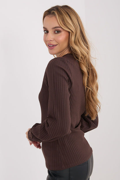 Dark brown ribbed long-sleeve blouse with crew neck and fitted side profile