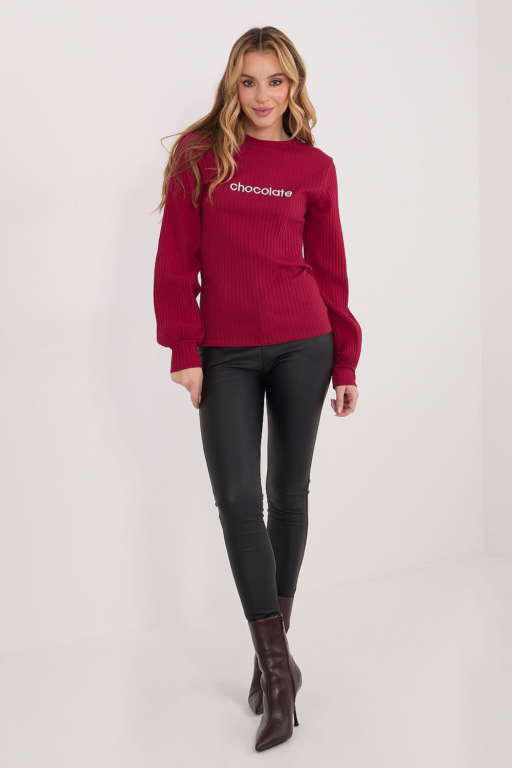 Red long-sleeve blouse with ribbed knit and embroidered front detail