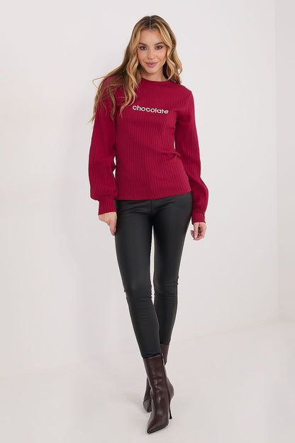 Red long-sleeve blouse with ribbed knit and embroidered front detail