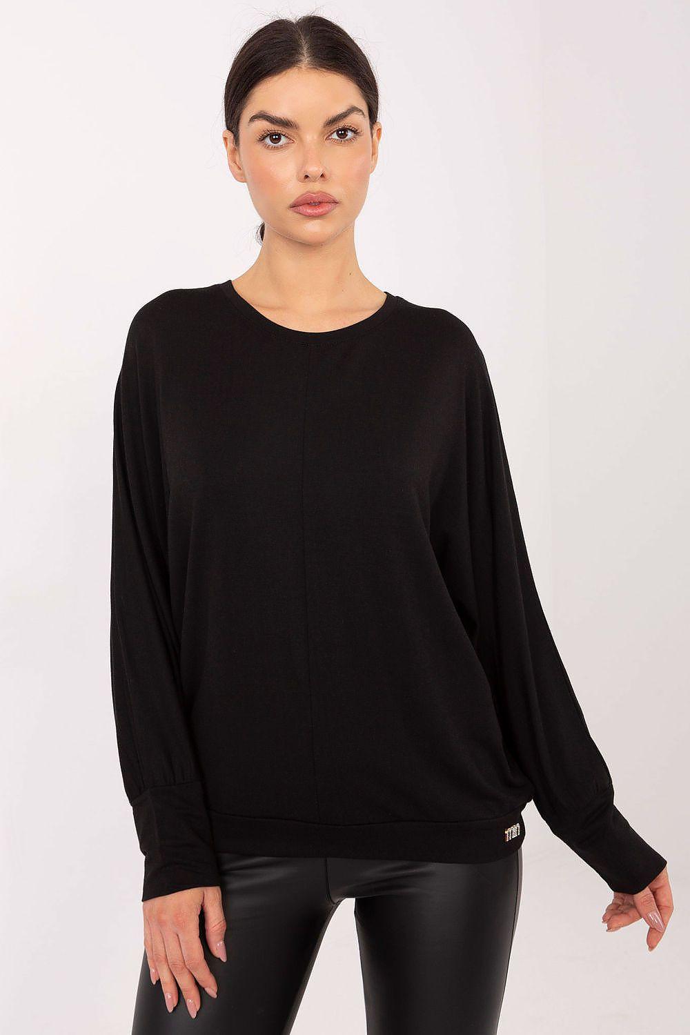 Black long-sleeve blouse with crew neckline and relaxed fit