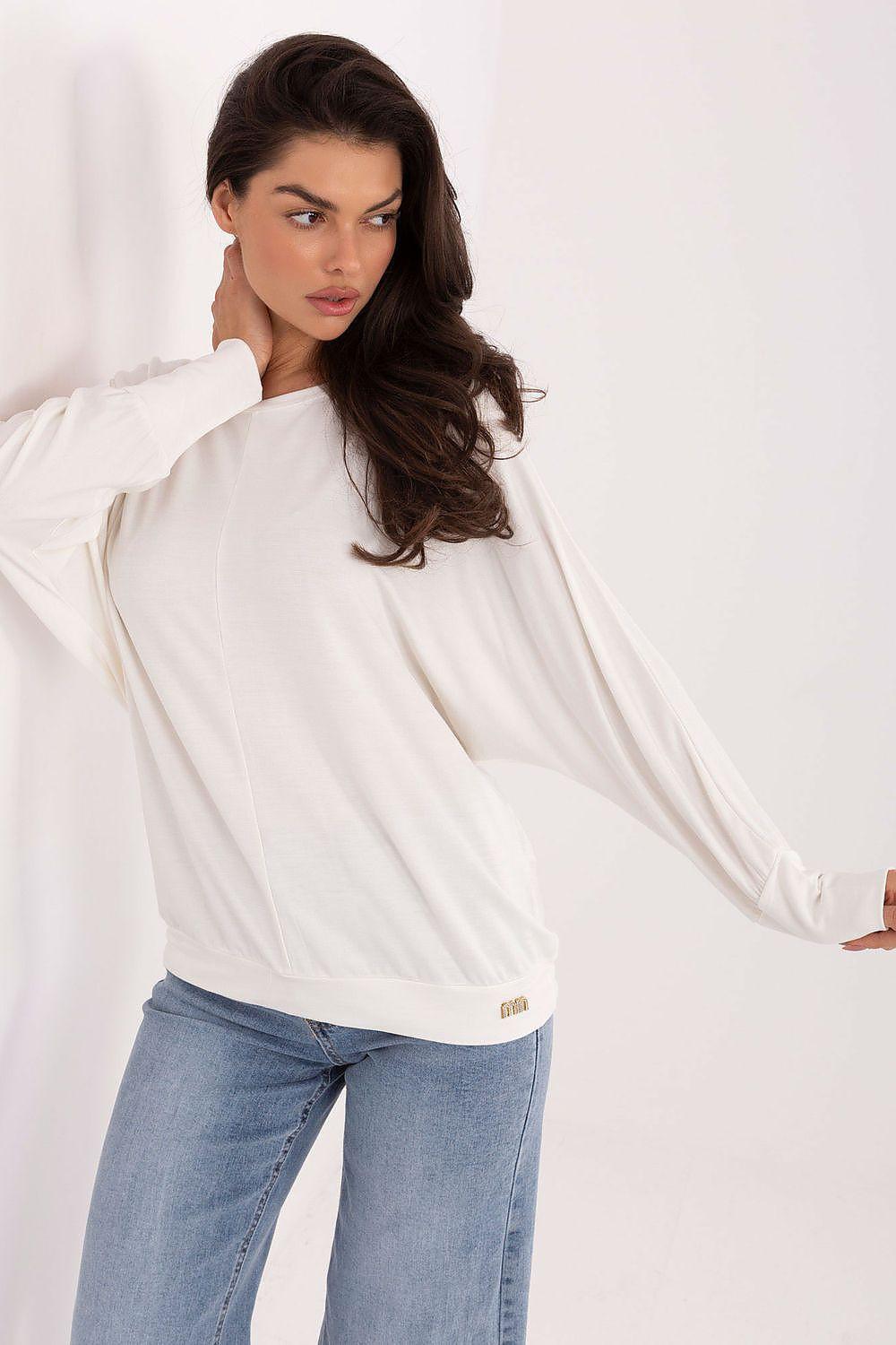 Beige long-sleeve blouse with crew neck and draped side view