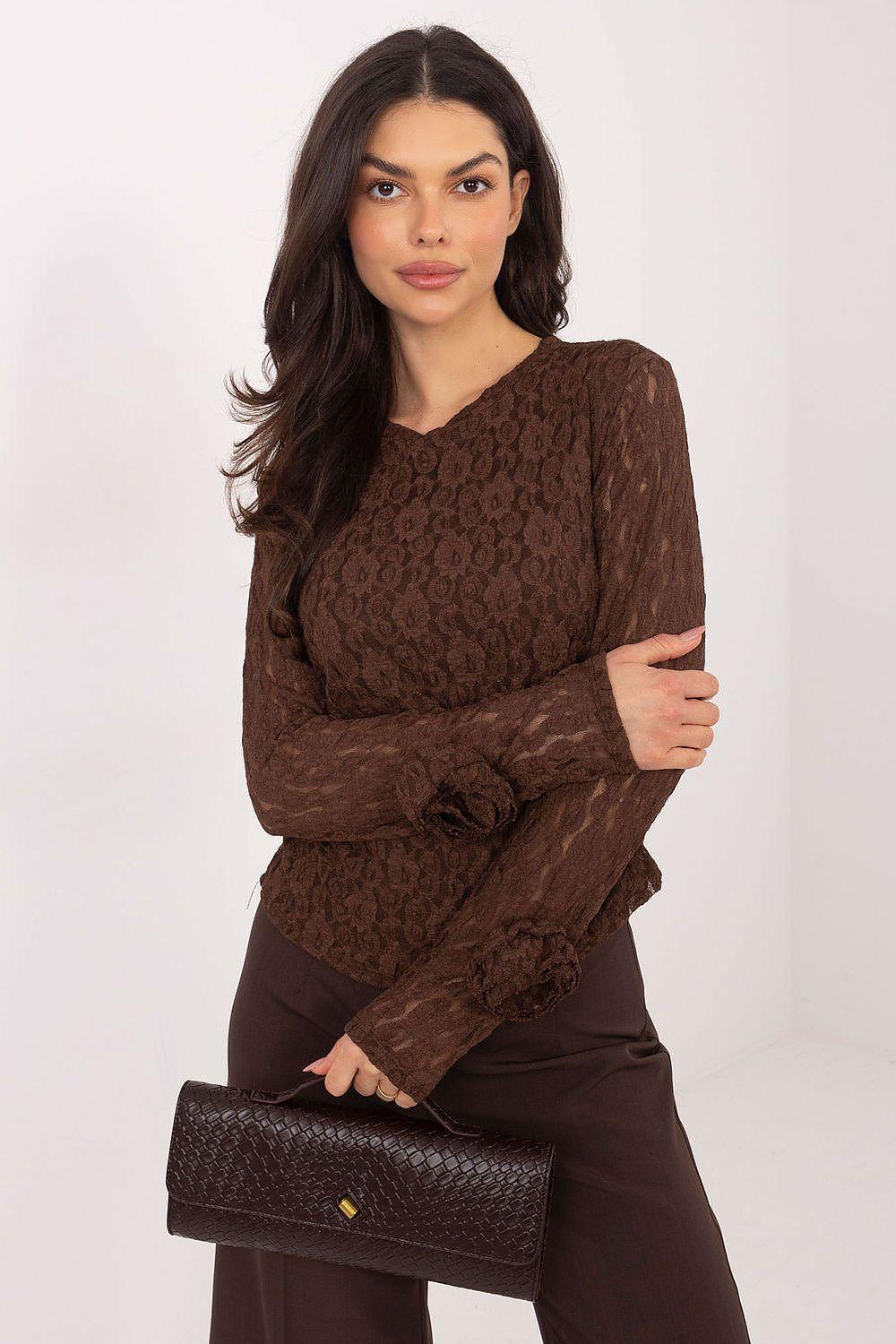 Brown lace blouse with long sleeves and ruffled cuffs, crew neckline