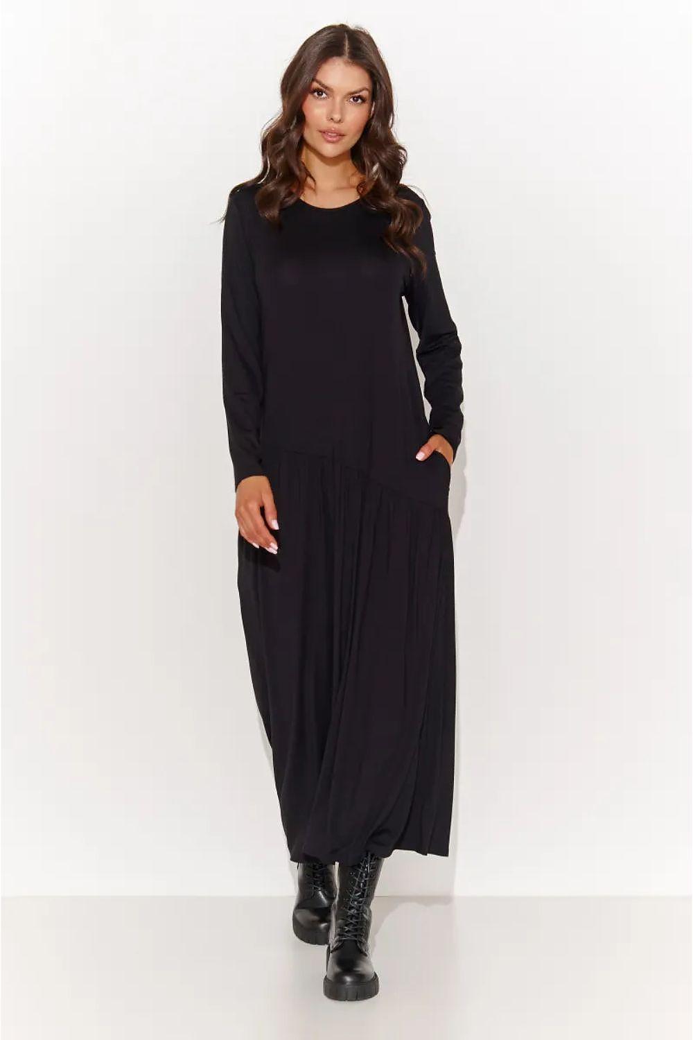 Black maxi day dress with long sleeves, crew neckline, asymmetric draped skirt