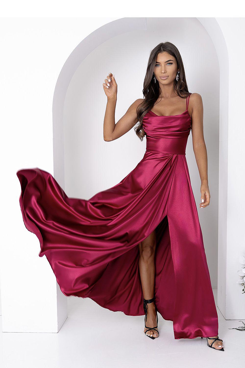 Long satin burgundy dress with spaghetti straps and front side slit, draped skirt