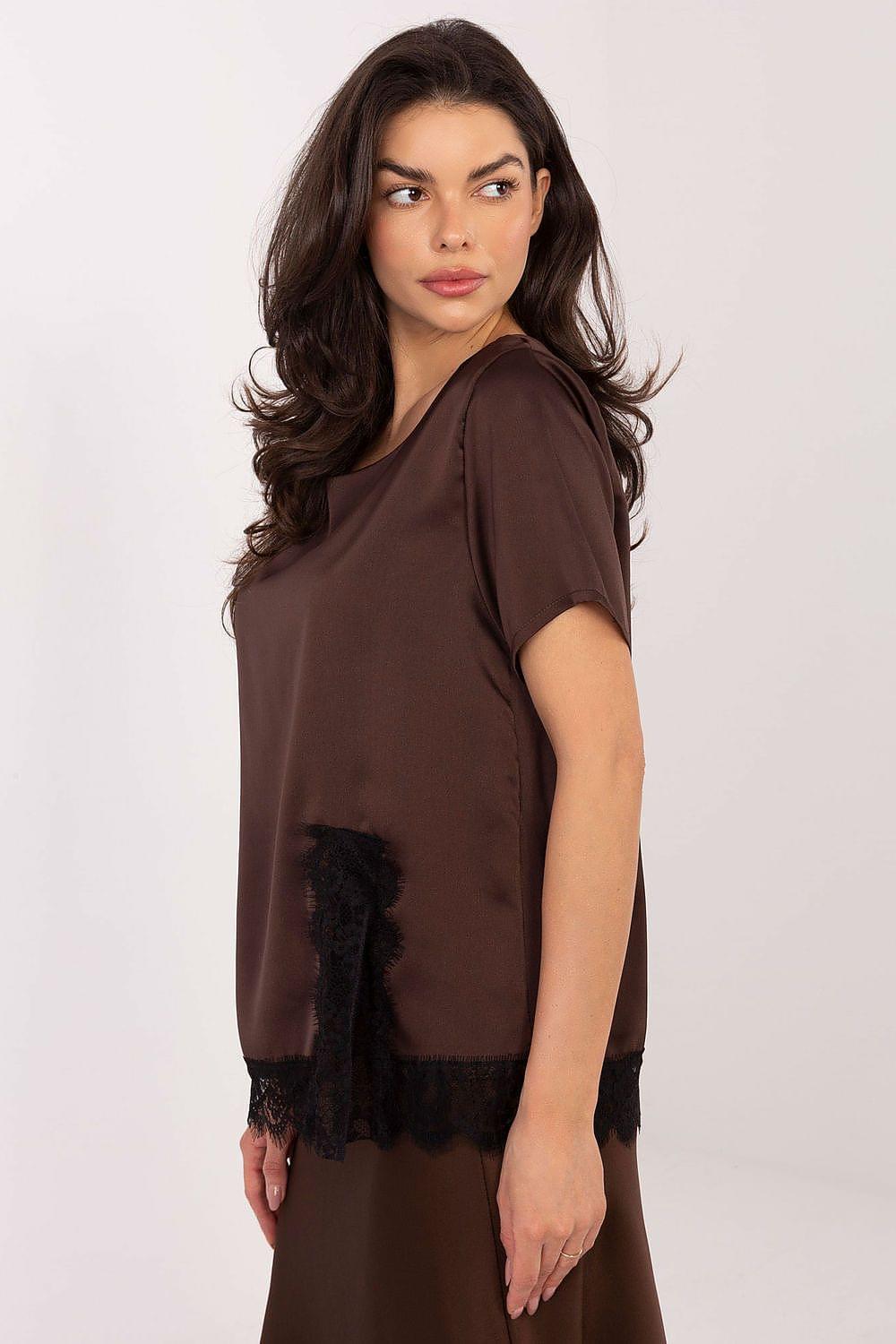 Brown satin blouse with short sleeves and black lace trim at the hem