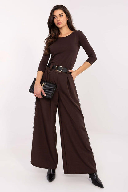 Brown long sleeve blouse with round neck and waist belt, front view