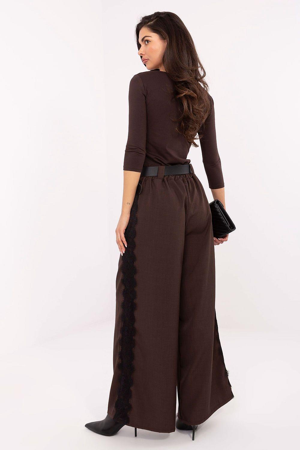 Brown long sleeve blouse with round neck and waist belt, side view