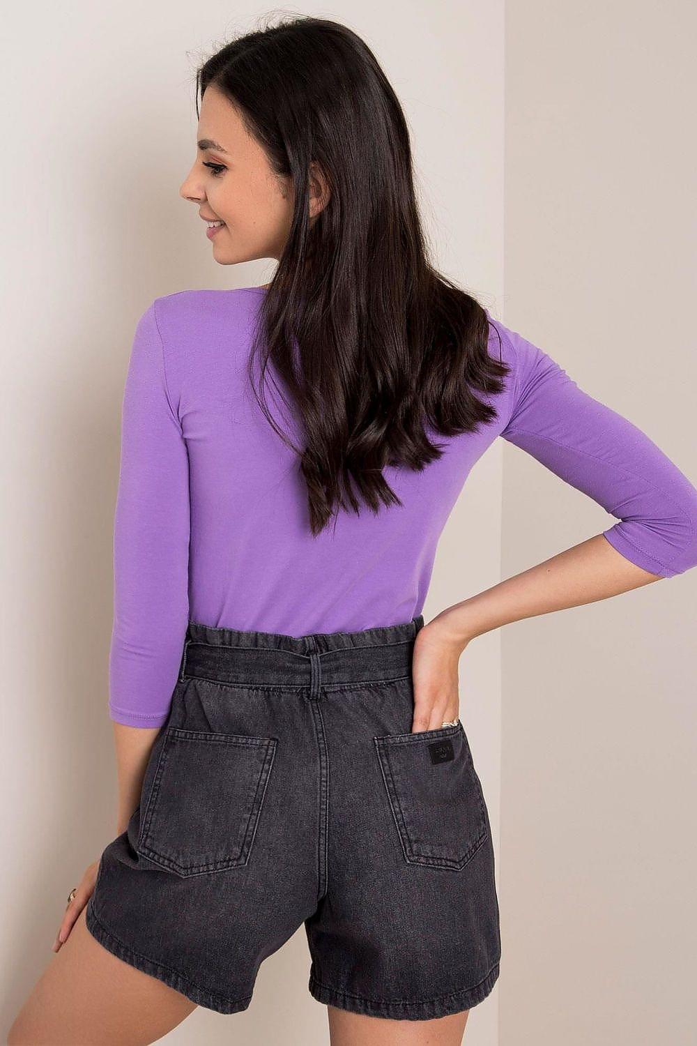 Purple long sleeve blouse with crew neck, side view
