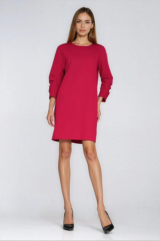 Red day dress with round neckline, long sleeves, and straight knee-length hem