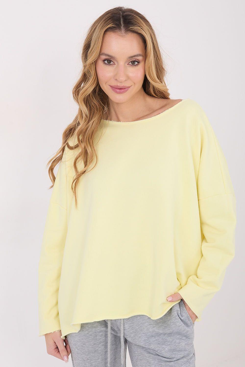 Yellow long-sleeve blouse with round neckline, loose fit