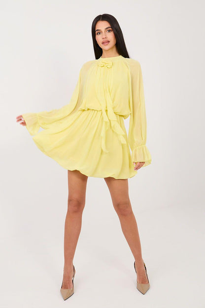 Light yellow short cocktail dress with draped sleeves and gathered waist, ruffle trim