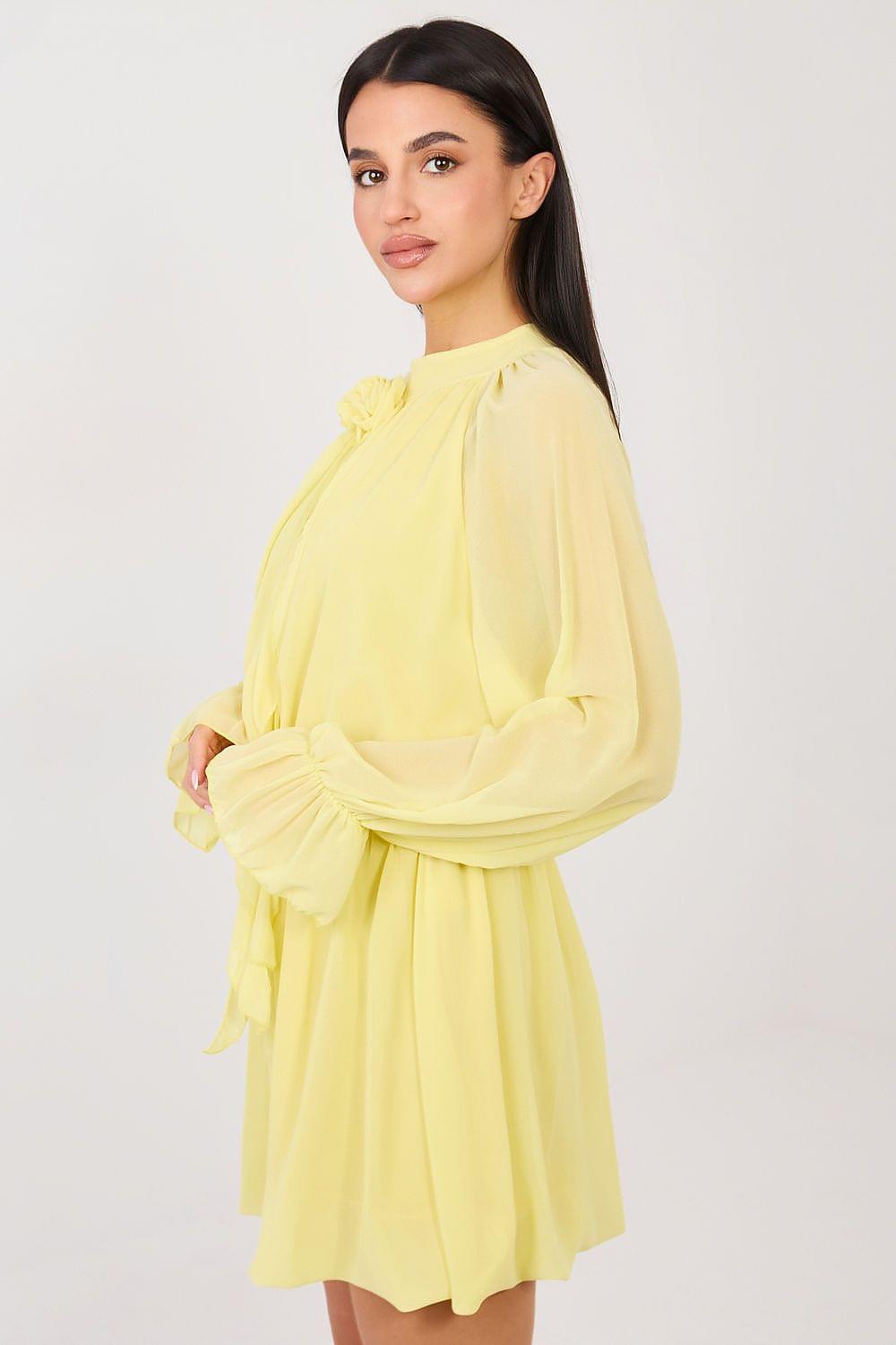 Light yellow cocktail dress with ruffled high neckline and long puff sleeves