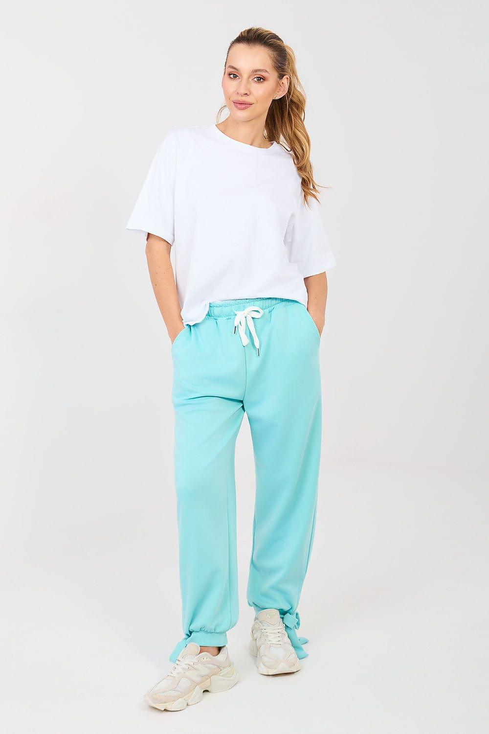 Turquoise jogger trousers with drawstring waist and cuffed hems, side pockets