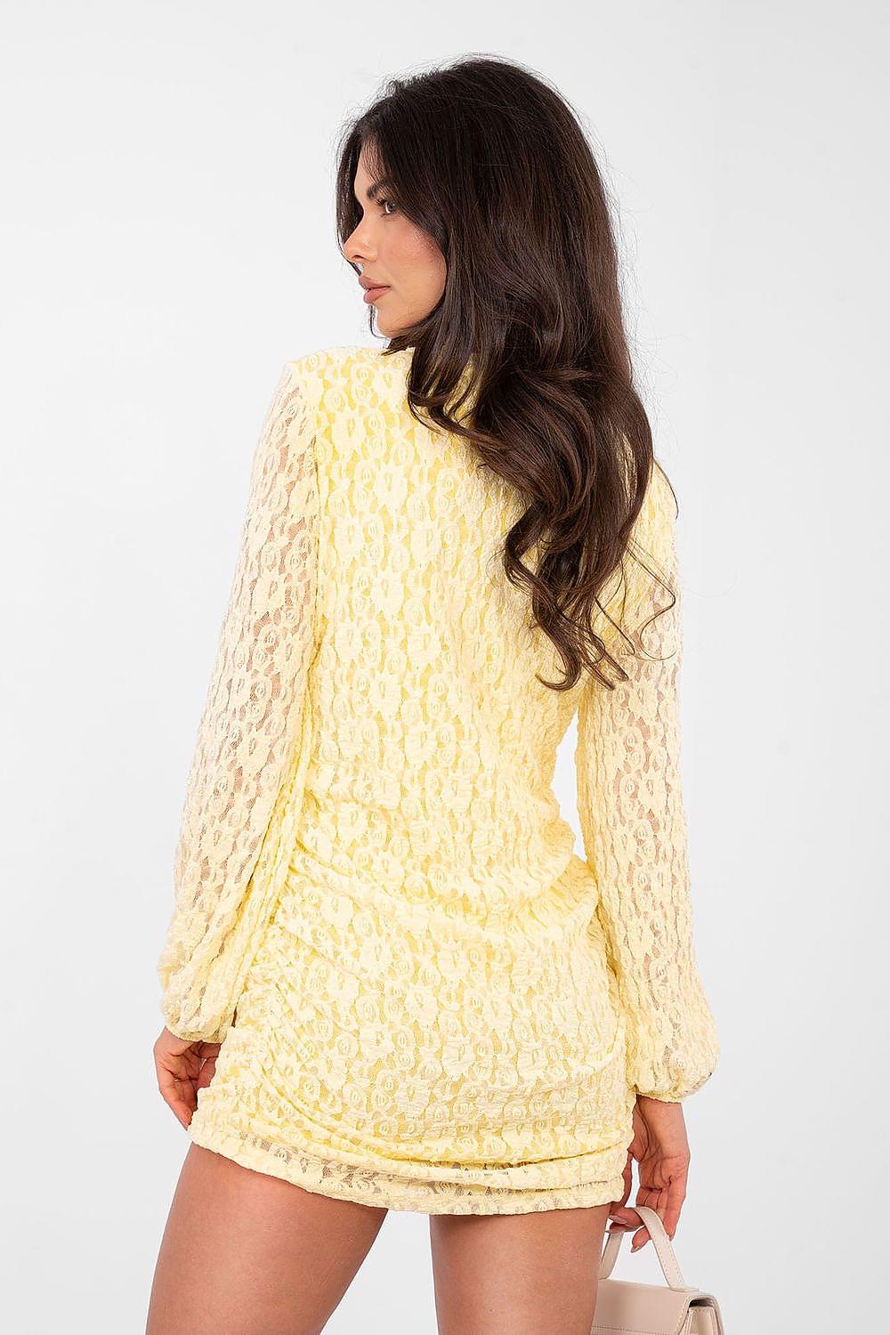 Back view light yellow textured mini dress with long sleeves and ruched hem