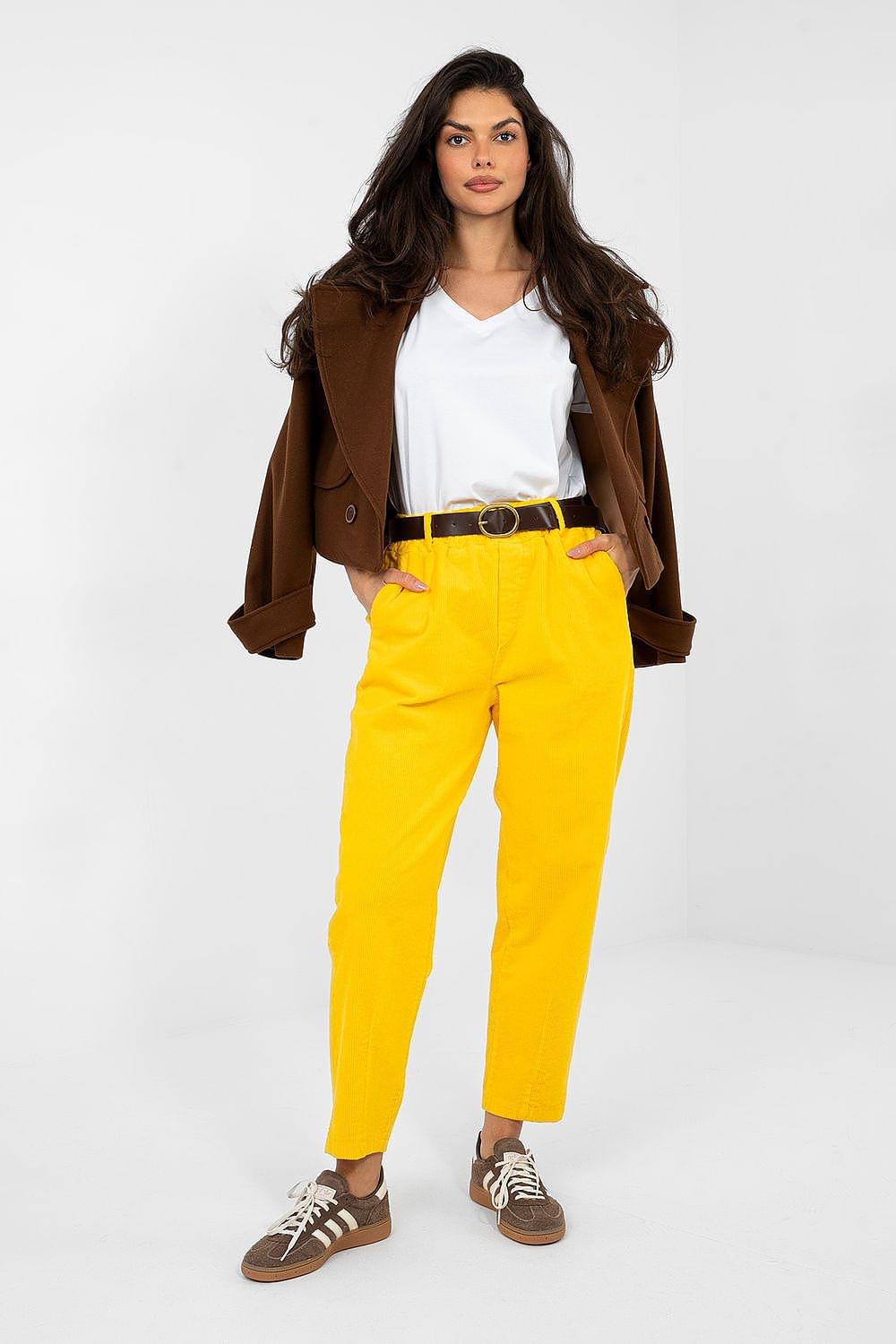 Yellow high-waist corduroy trousers with belt loops and button closure at front
