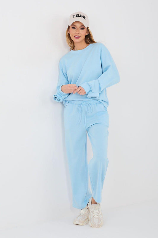 Light blue womens lounge set with long-sleeve sweatshirt and drawstring wide-leg pants
