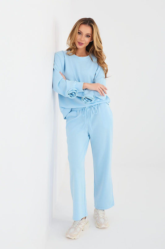 Light blue womens lounge set with cuffed sweatshirt sleeves and matching drawstring pants