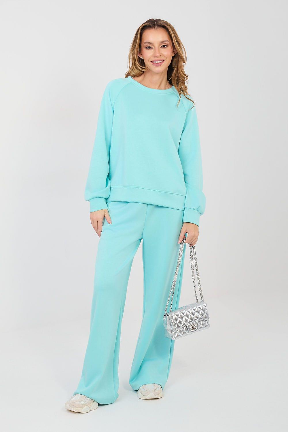 Light teal two-piece lounge set with crewneck sweatshirt and wide-leg pants