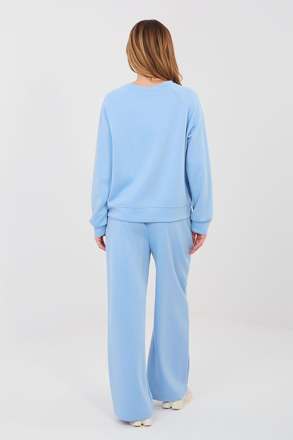 Light blue two-piece set with crewneck sweatshirt and wide-leg pants, back view