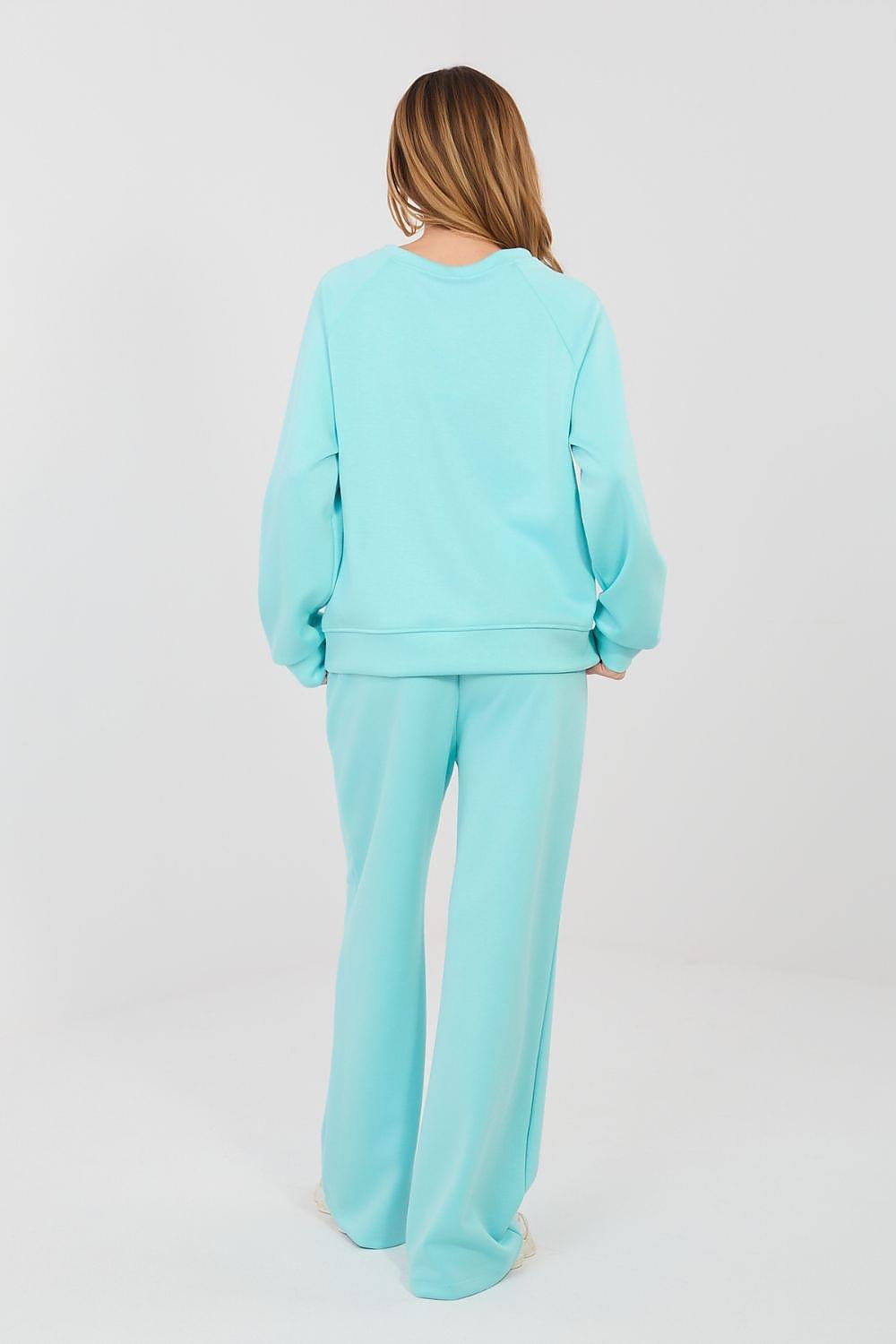 Light teal two-piece set with crewneck sweatshirt and wide-leg pants, back view