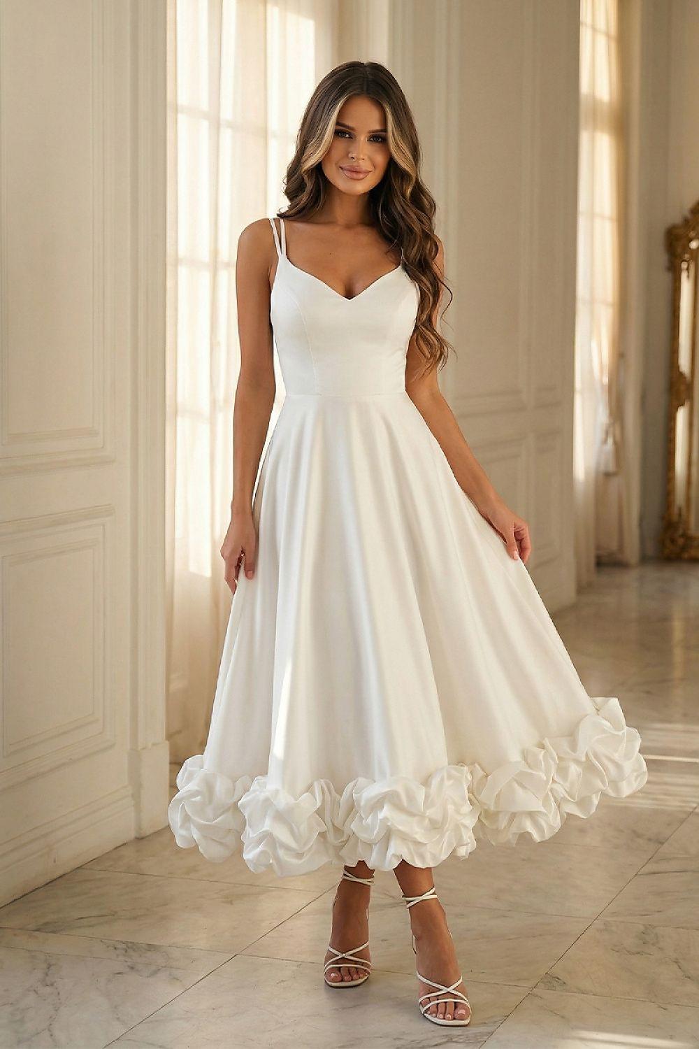 White cocktail dress with sweetheart V-neck and layered ruffle skirt