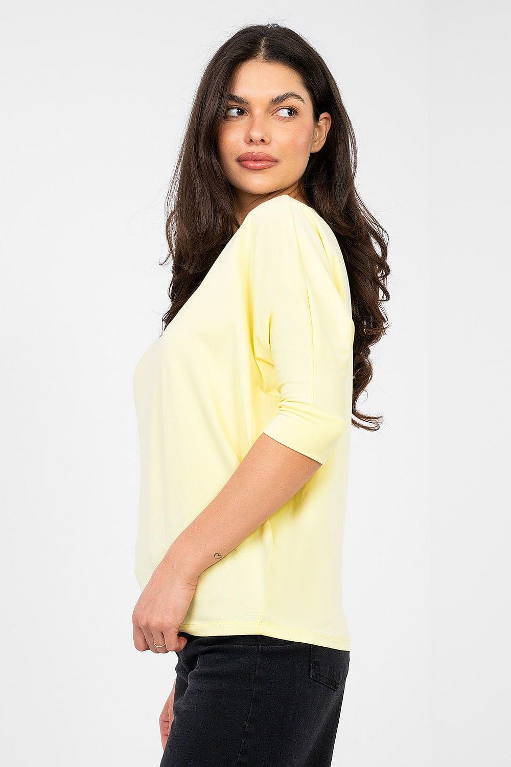 Yellow V-neck blouse with 3/4 sleeves, side view