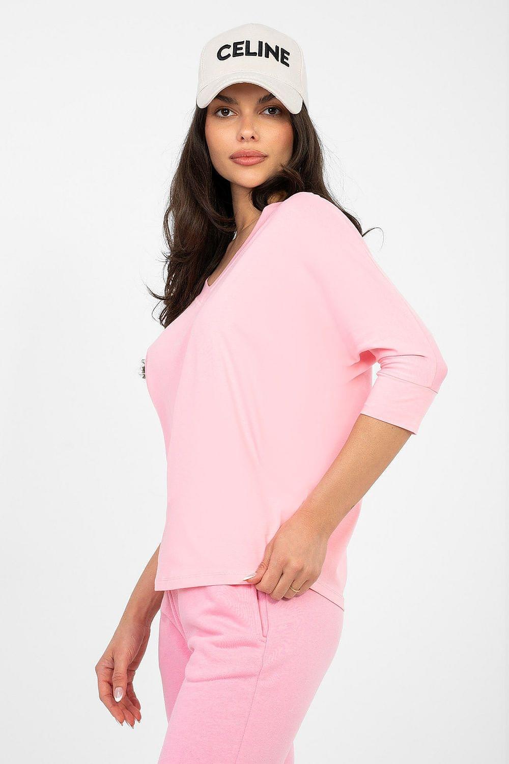 Pink V-neck blouse with 3/4 sleeves, side view