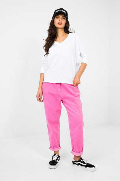 White V-neck blouse with rolled sleeves and relaxed fit