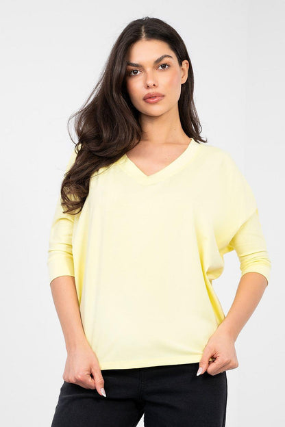 Yellow V-neck blouse with 3/4 sleeves, front view