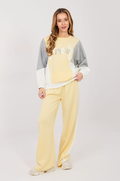 Yellow and gray two-piece lounge set with long-sleeve sweatshirt and wide-leg pants