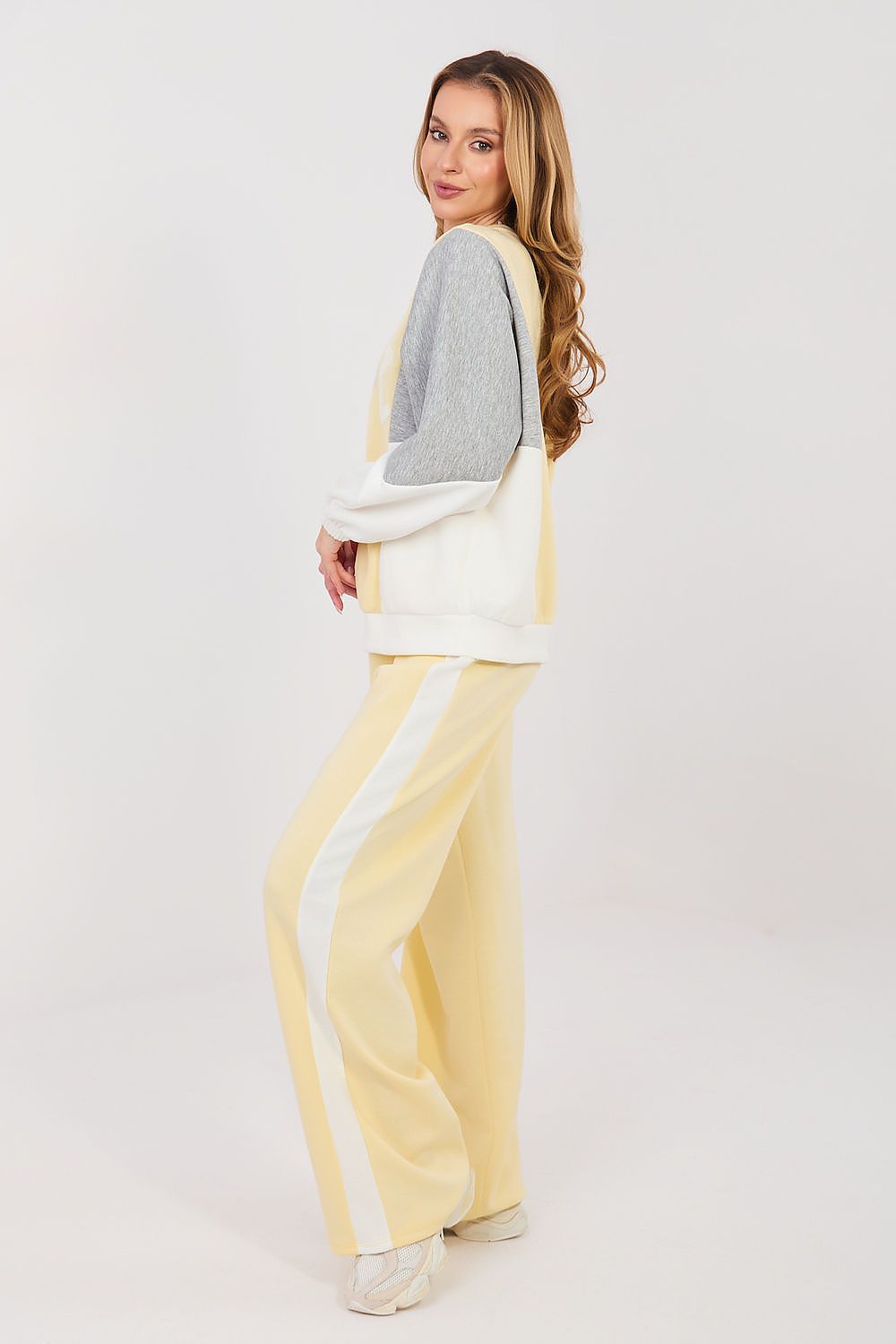 Yellow and cream two-piece lounge set with long-sleeve sweatshirt and wide-leg pants