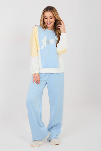Light blue and cream two-piece lounge set with long-sleeve sweatshirt and wide-leg pants