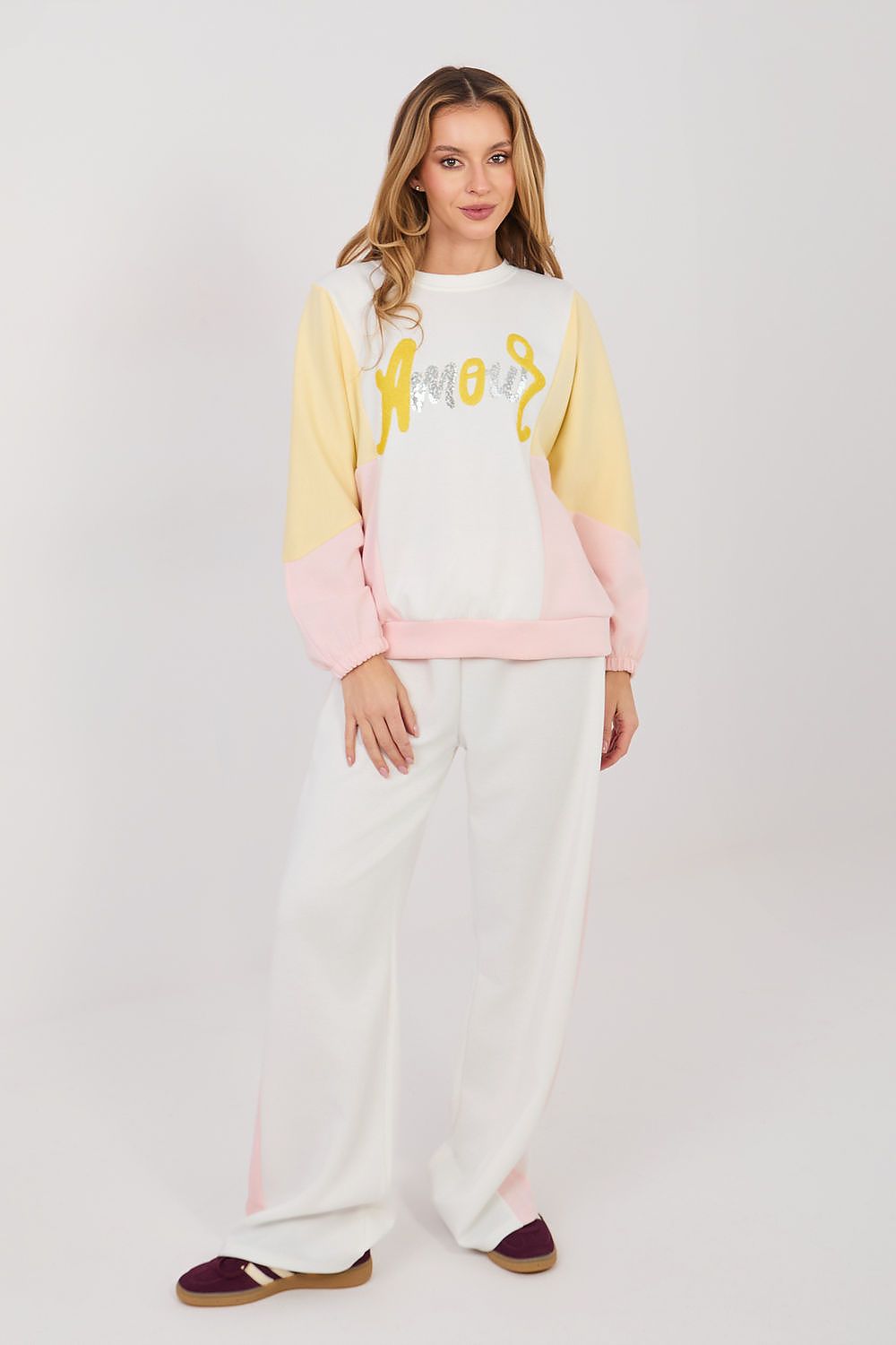 Color-block sweatshirt and wide-leg pants set, white pants with yellow and pink panel top