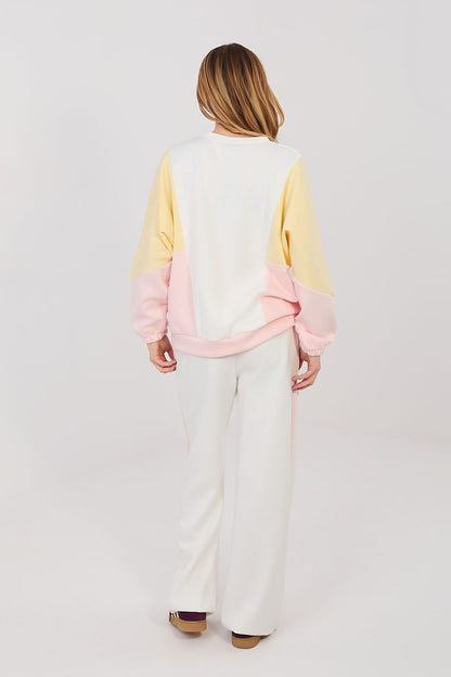 Color-block sweatshirt and wide-leg pants set, white pants with yellow sleeves and pink back panel