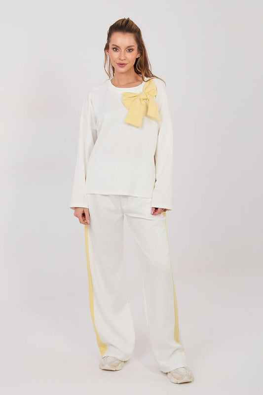 Two-piece lounge set with long-sleeve top and wide-leg pants, yellow bow neckline, white