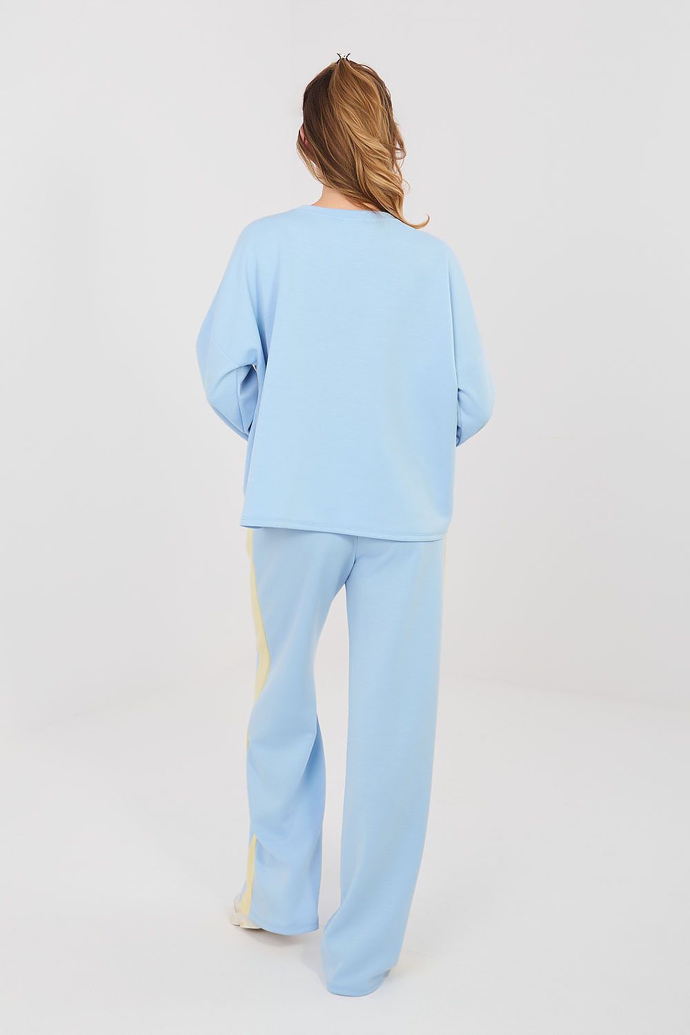 Light blue two-piece set with long-sleeve blouse and wide-leg pants, back view