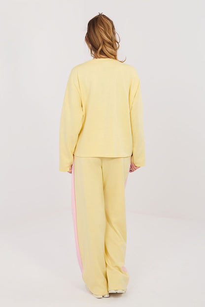 Yellow two-piece set with long-sleeve blouse and wide-leg pants, pink side stripe