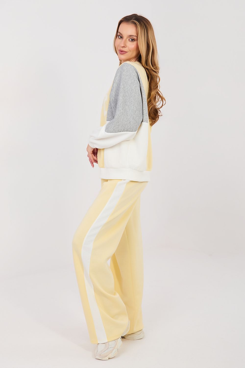 Yellow and cream two-piece lounge set with long-sleeve sweatshirt and wide-leg pants
