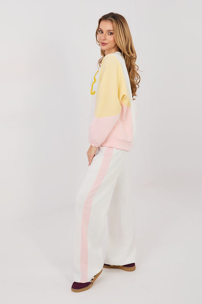 Color-block sweatshirt and wide-leg pants set, white pants with pale yellow and pink panels