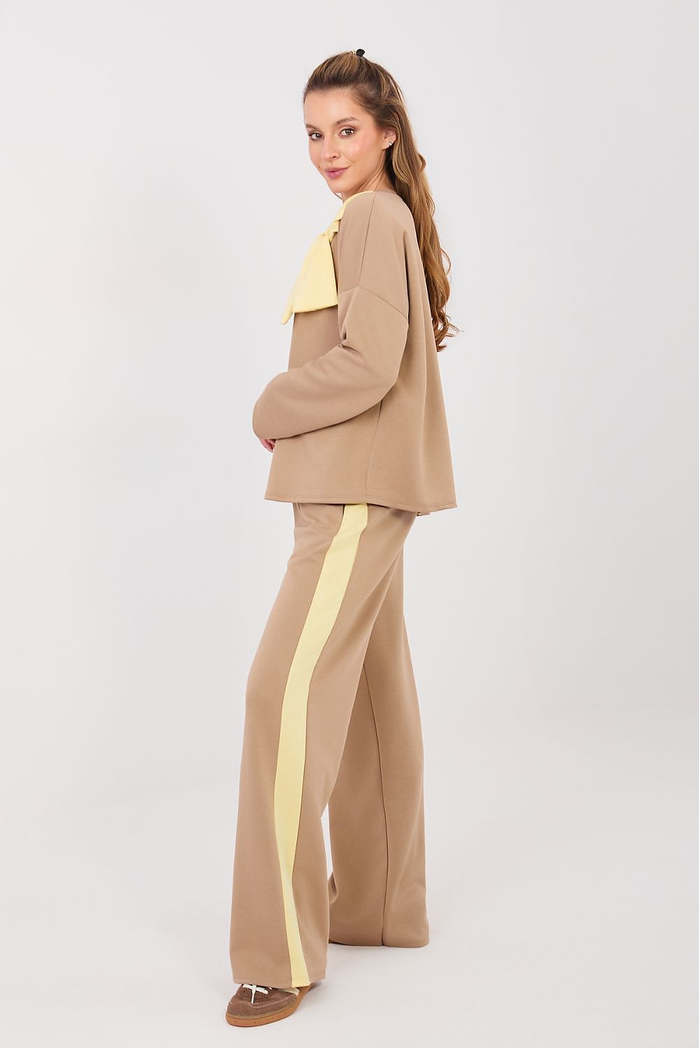 Tan pants and top set with long sleeves and wide-leg trousers, yellow accent